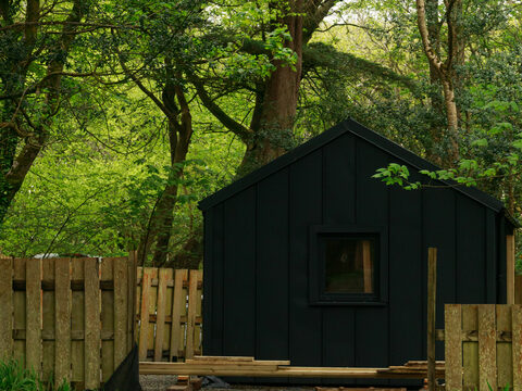 a cosy self-catering woodland cabin for two at Inish Beg Estate